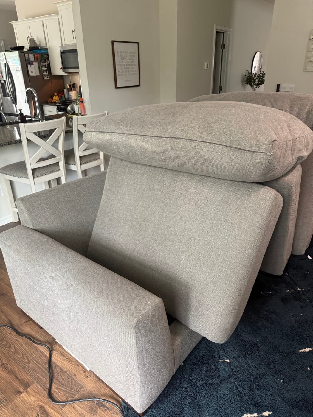 The same beige three-seat sofa after steam cleaning