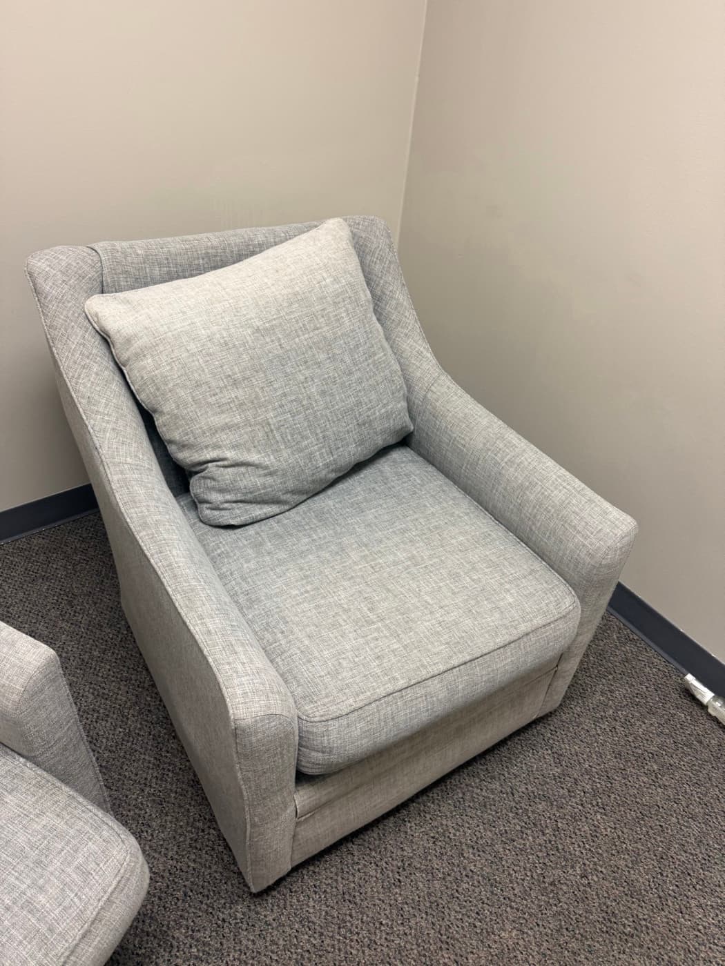 The same cream armchair after steam cleaning
