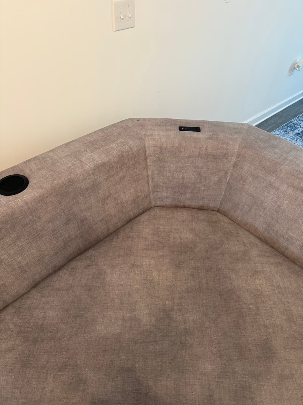 The same beige sofa back after steam cleaning