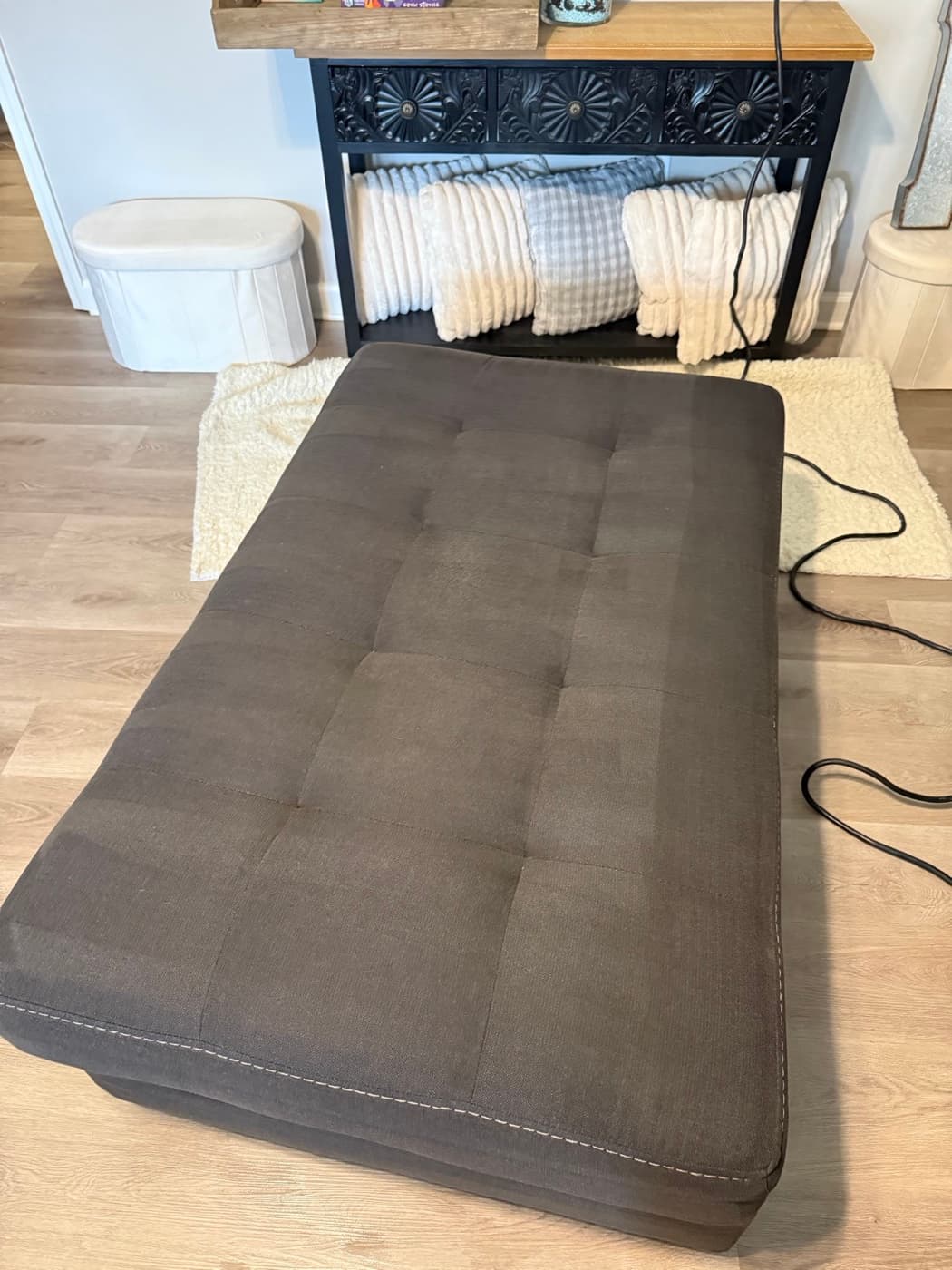 The same beige tufted sofa bed after steam cleaning