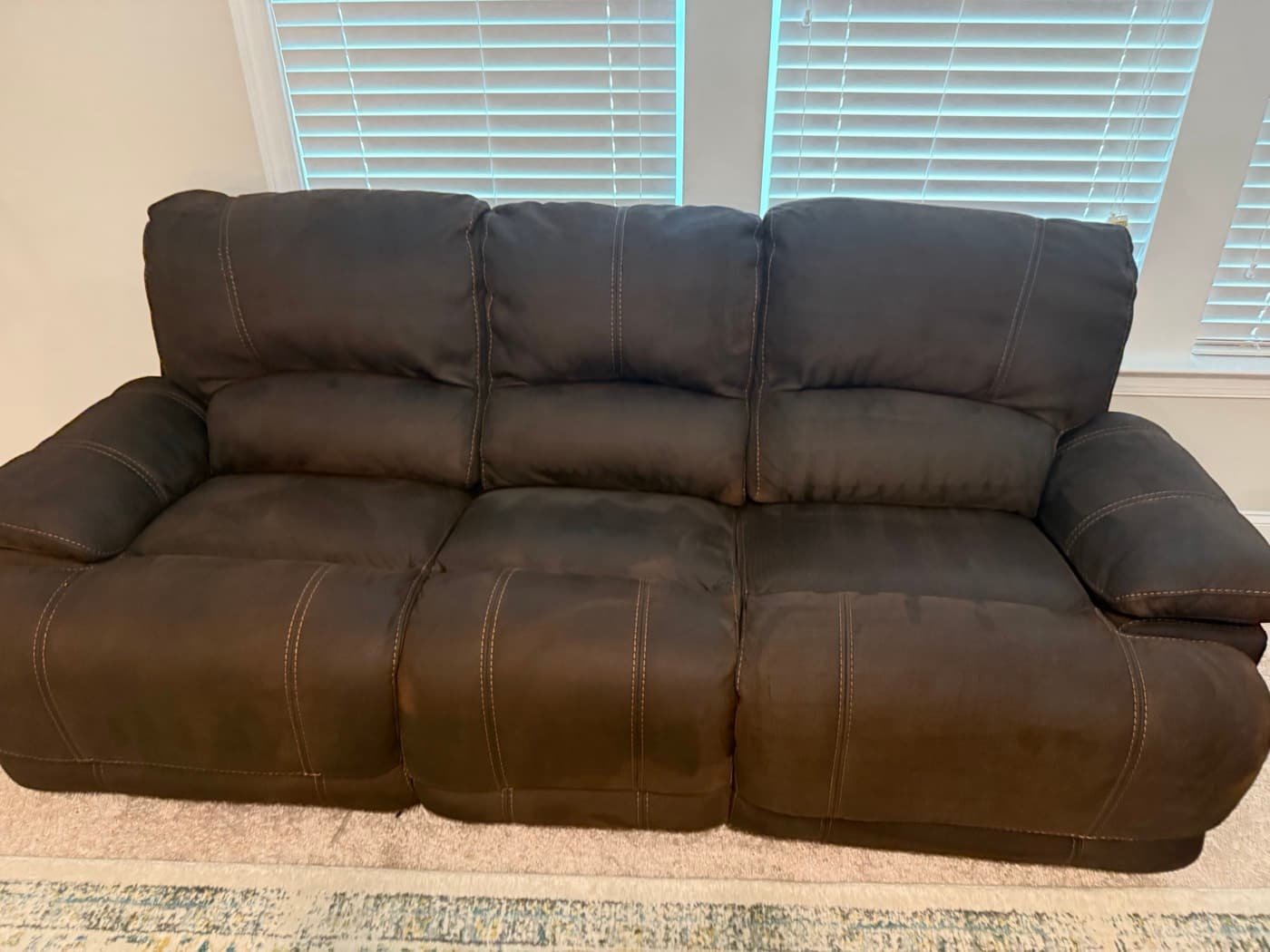 The same taupe three-seat reclining sofa after steam cleaning