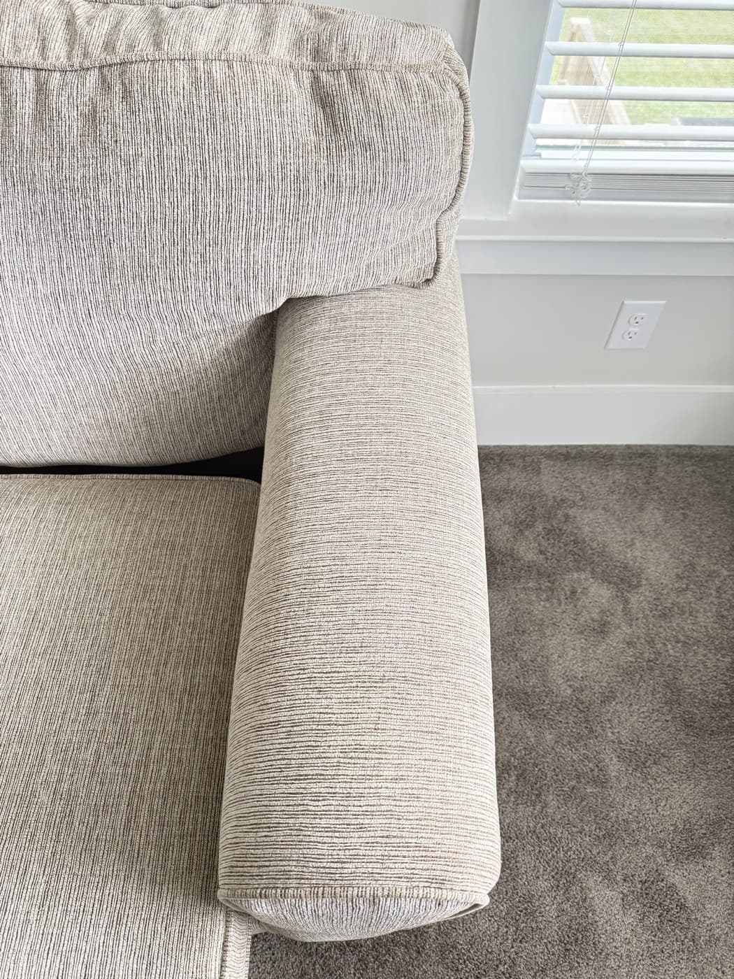 The same grey sofa after steam cleaning