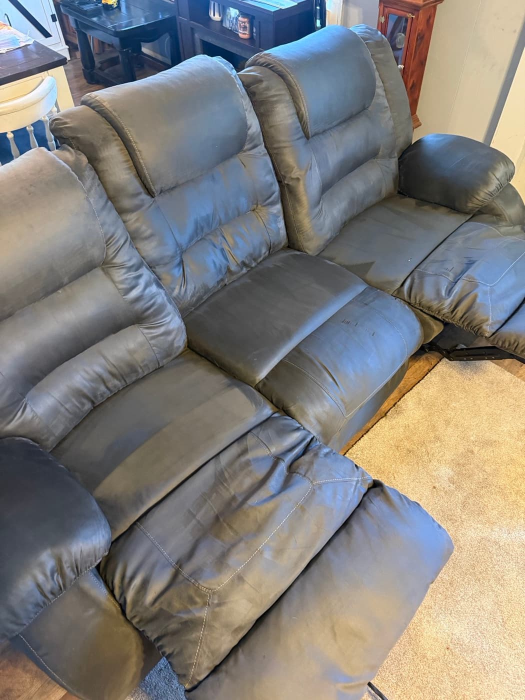 The same taupe reclining sectional after steam cleaning