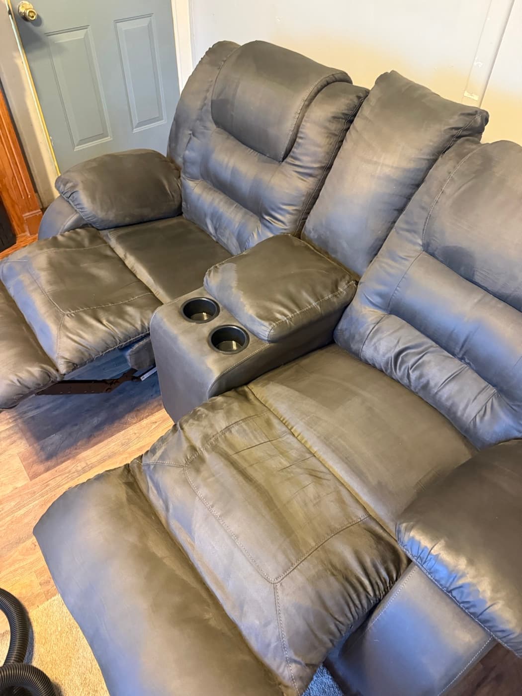 The same taupe reclining sofa after steam cleaning